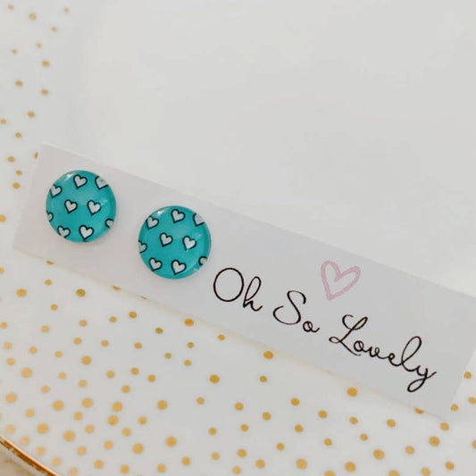 Turquoise studs with white hearts